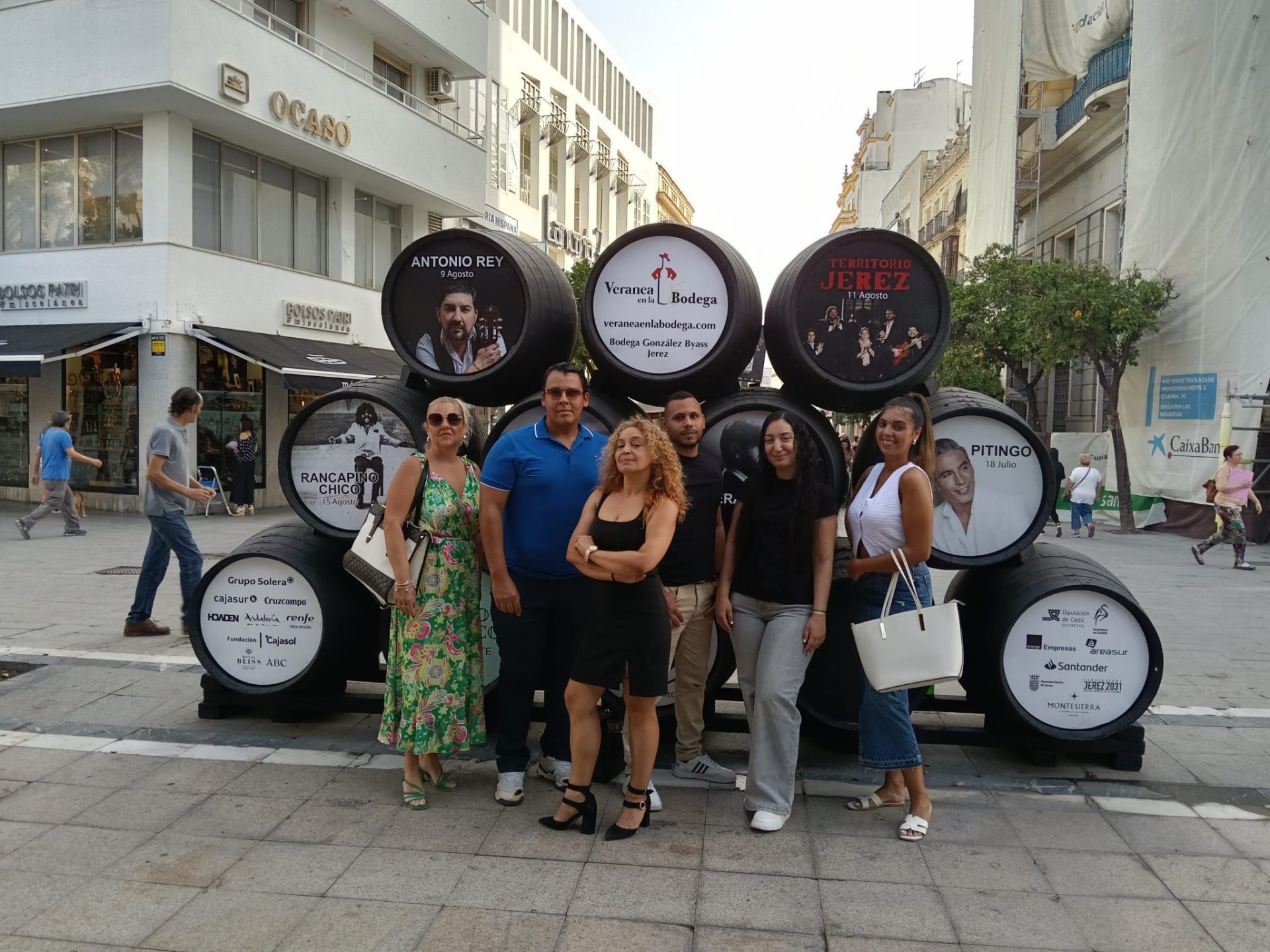 Happy co-workers keeping their han